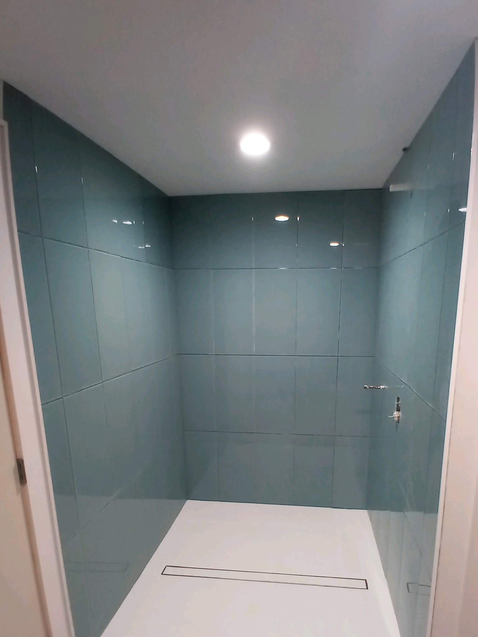 beautiful blue tile shower installation, wfa's custom hardwood floors, houston texas